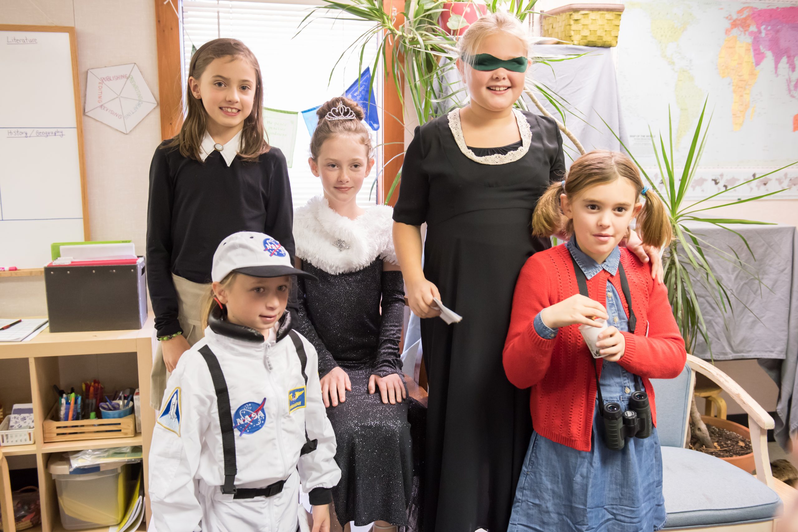 Montessori Upper El students are dressed up as historical figures for Mystery History