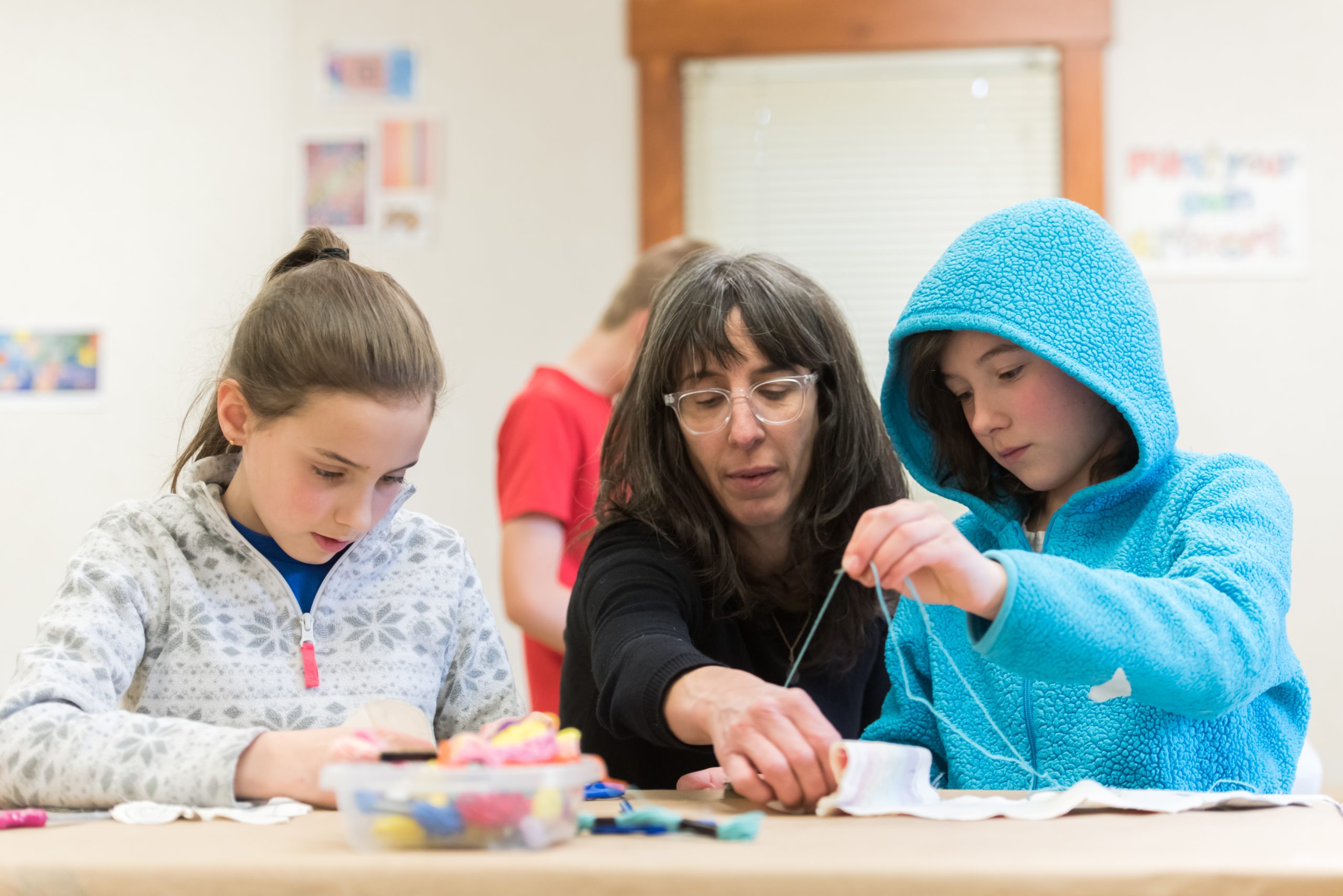 Montessori students take part in an art class